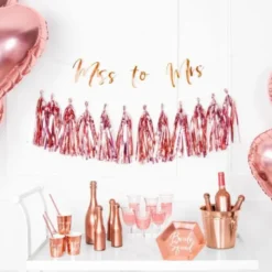 Girlang med Tofsar Roséguld